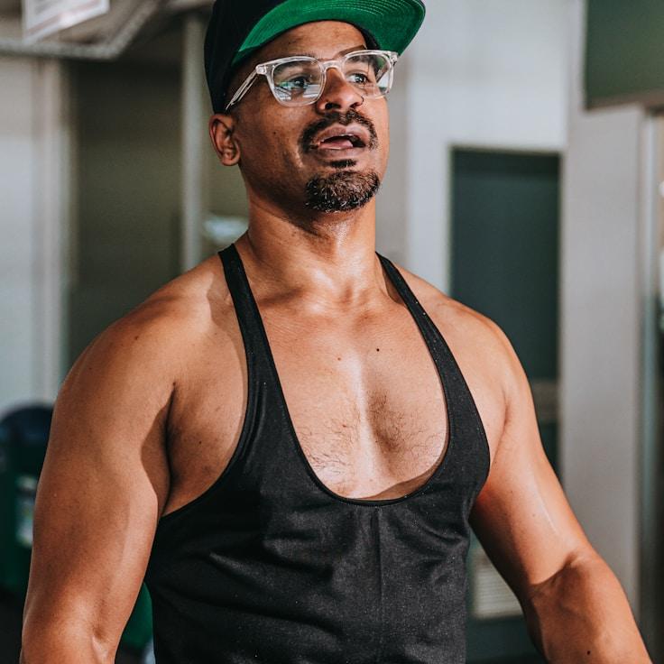 Interior of a professional gym with weight training equipment and mirrors